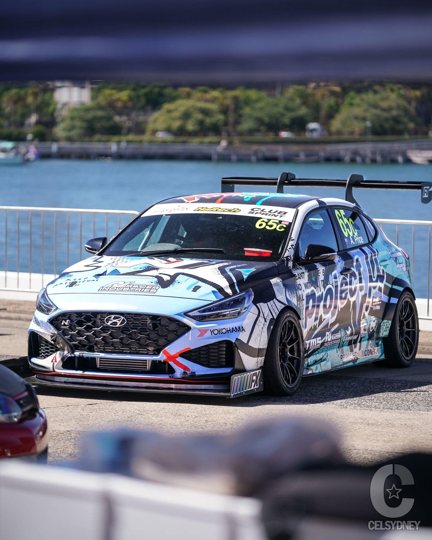 Step-by-step process of creating custom motorsport livery, from consultation to final design and application.