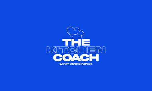 The Kitchen Coach logo in blue and white with clean, professional styling.