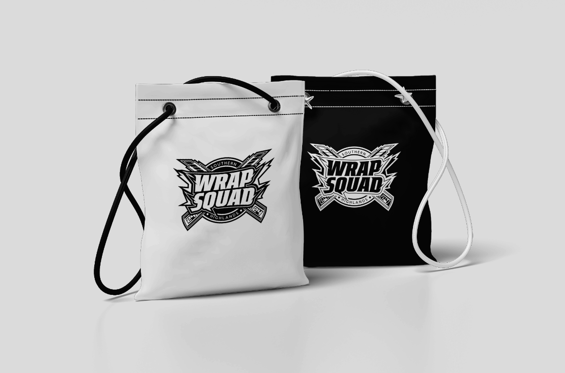 Black and white custom drawstring bags with the Wrap Squad logo, representing unique and branded packaging options designed for impactful brand presentation.